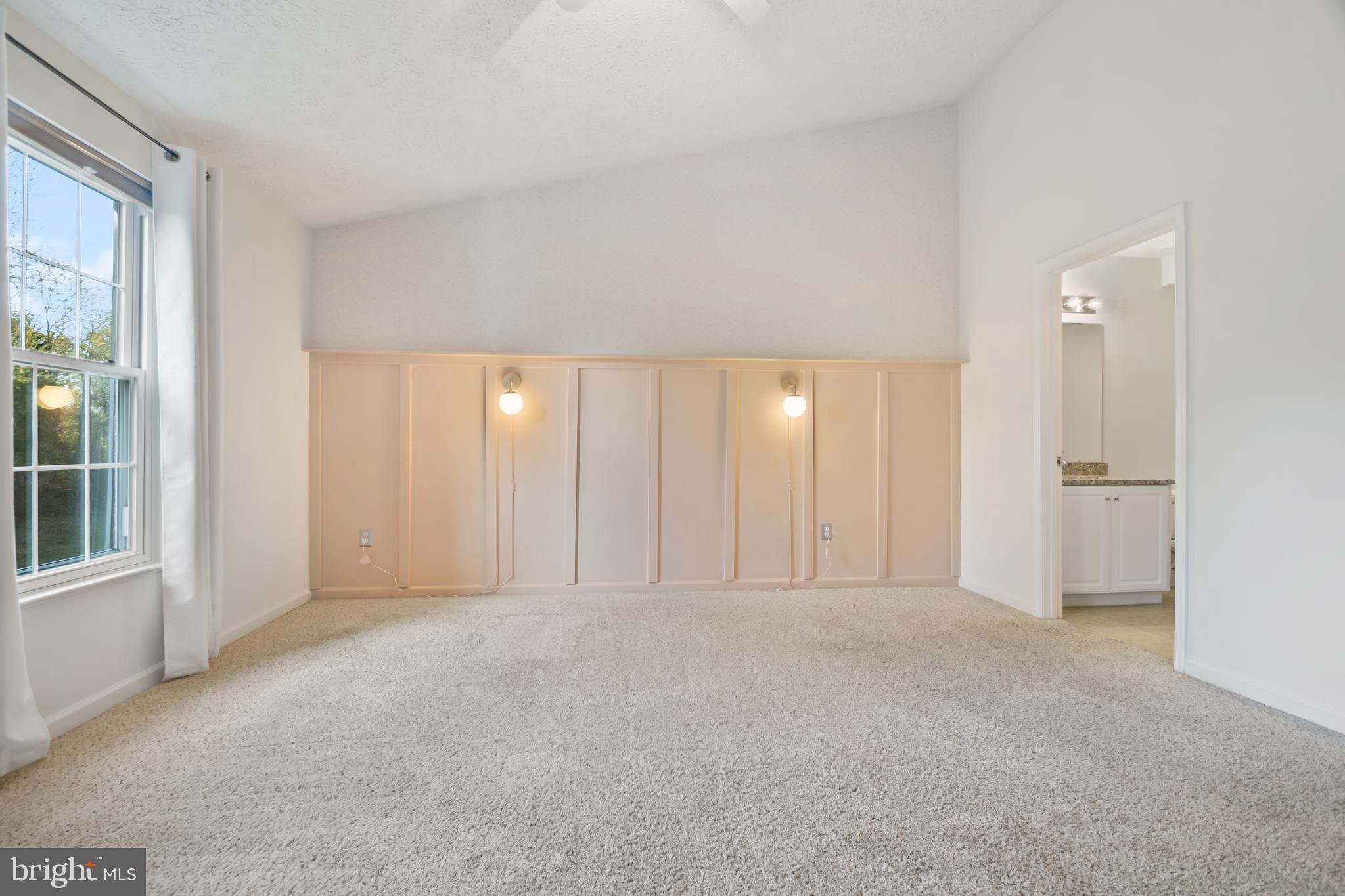 8265 Poplar Mill Road, Unit 8265 Nottingham, MD 21236 - Photo 13 of 35 a view of an empty room and a window