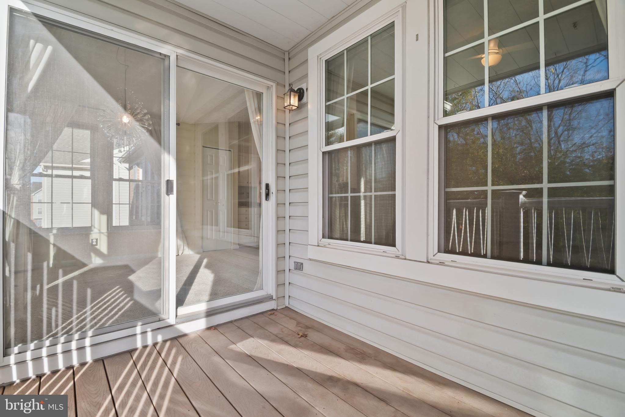 8265 Poplar Mill Road, Unit 8265 Nottingham, MD 21236 - Photo 31 of 35 a view of a house with a large window