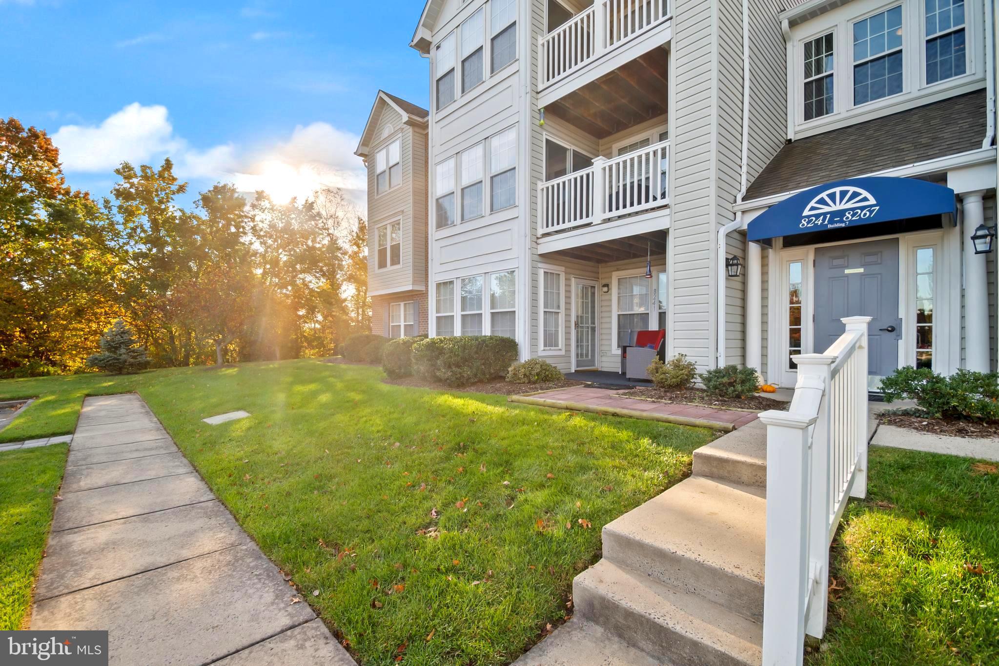 8265 Poplar Mill Road, Unit 8265 Nottingham, MD 21236 - Photo 33 of 35 a front view of a house with garden