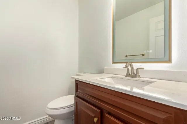 a bathroom with a sink and a toilet