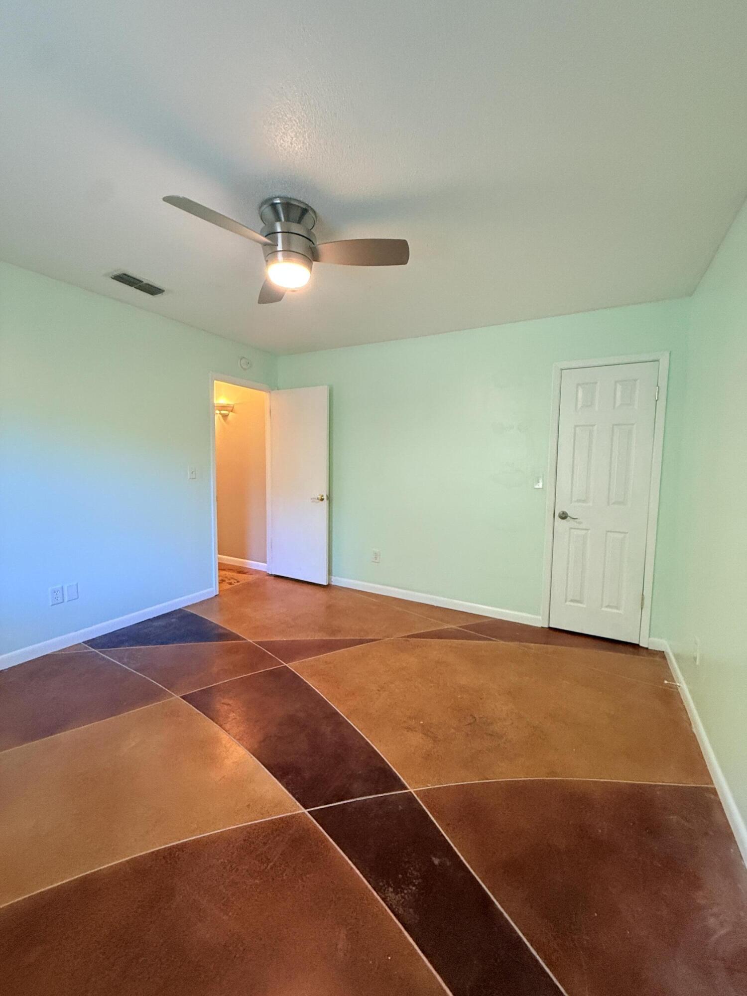255 Ridge Lake Road Crestview, FL 32536 - Photo 17 of 39 a view of a room with a ceiling fan and window