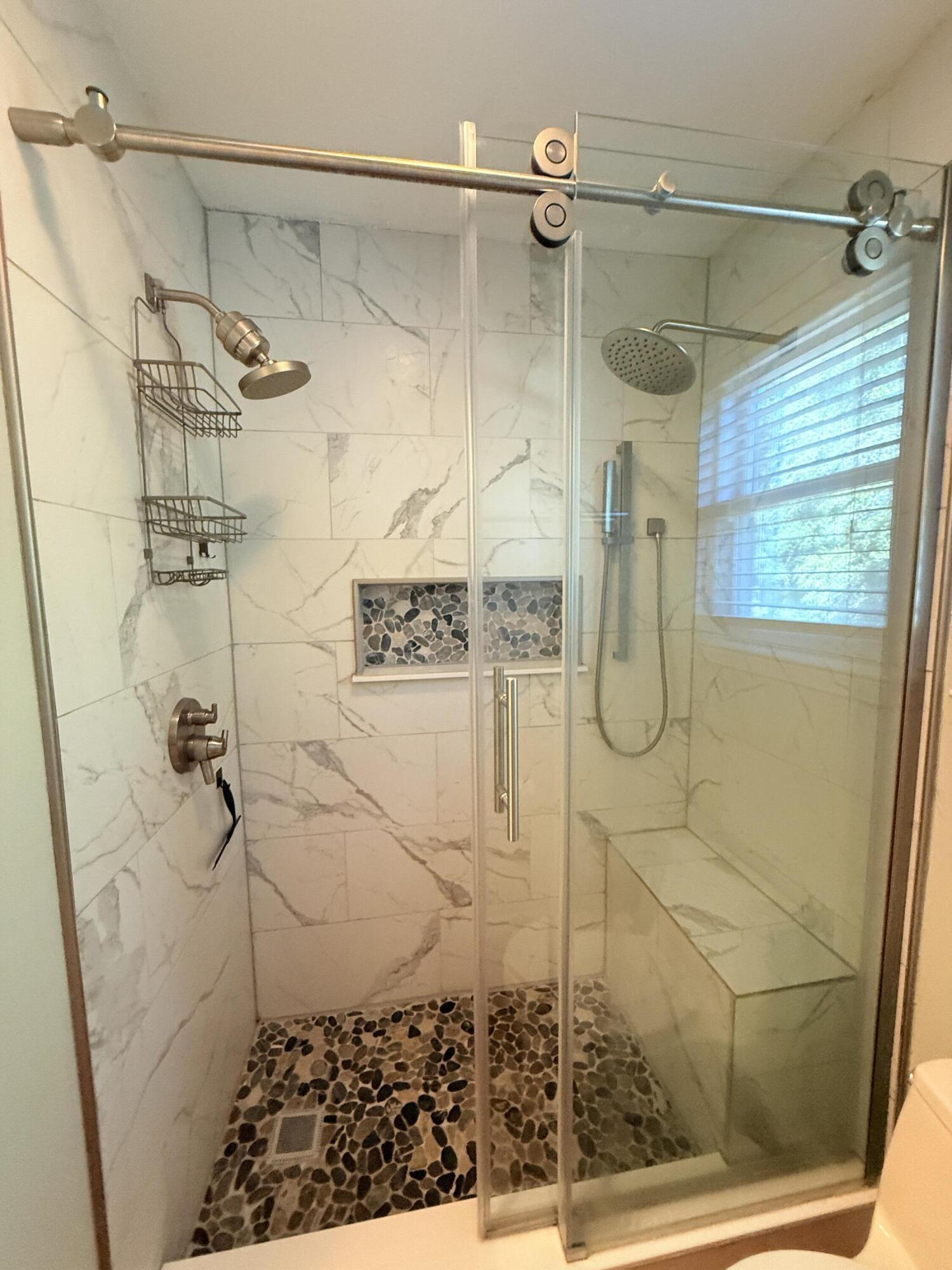 255 Ridge Lake Road Crestview, FL 32536 - Photo 24 of 39 a bathroom with a shower