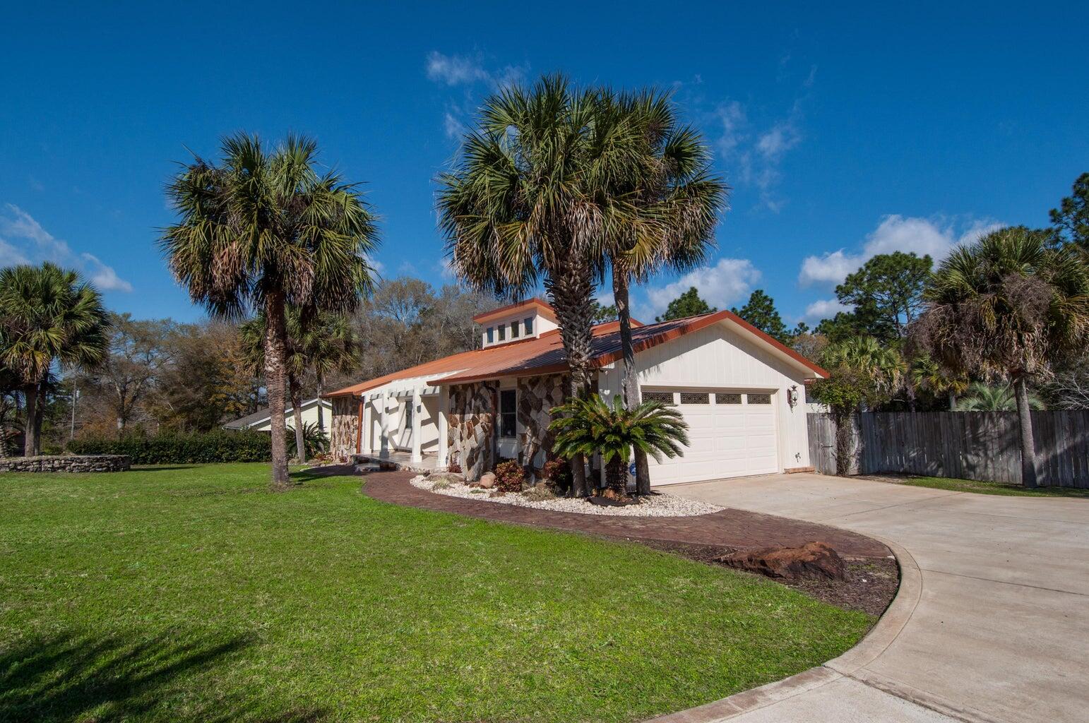 255 Ridge Lake Road Crestview, FL 32536 - Photo 39 of 39 a front view of a house with garden