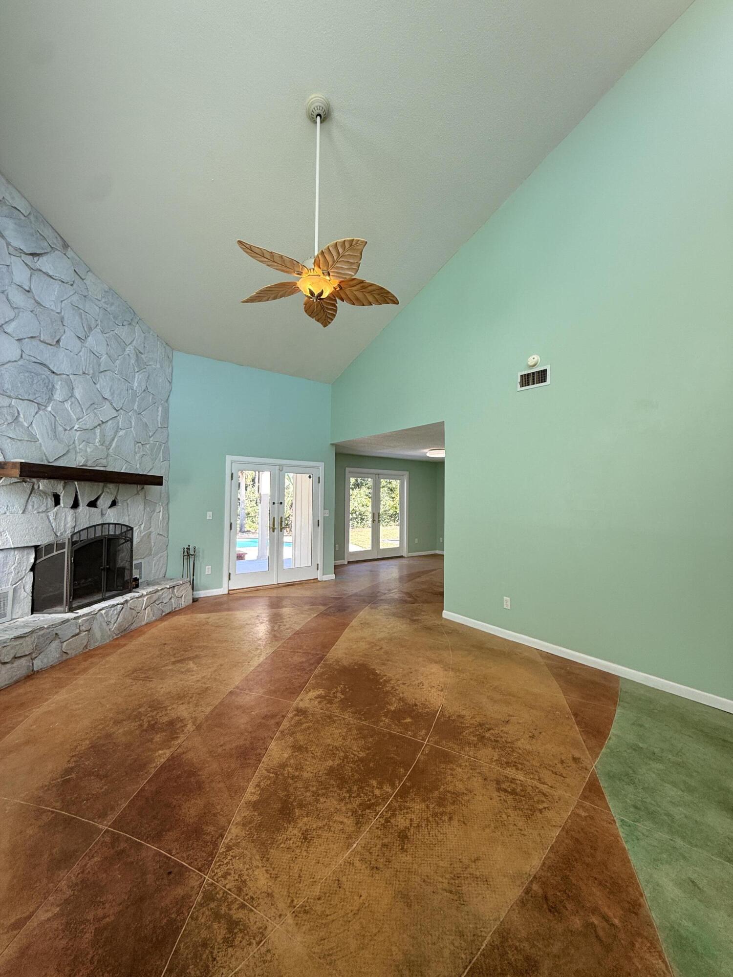 255 Ridge Lake Road Crestview, FL 32536 - Photo 7 of 39 a view of an empty room with window and fireplace