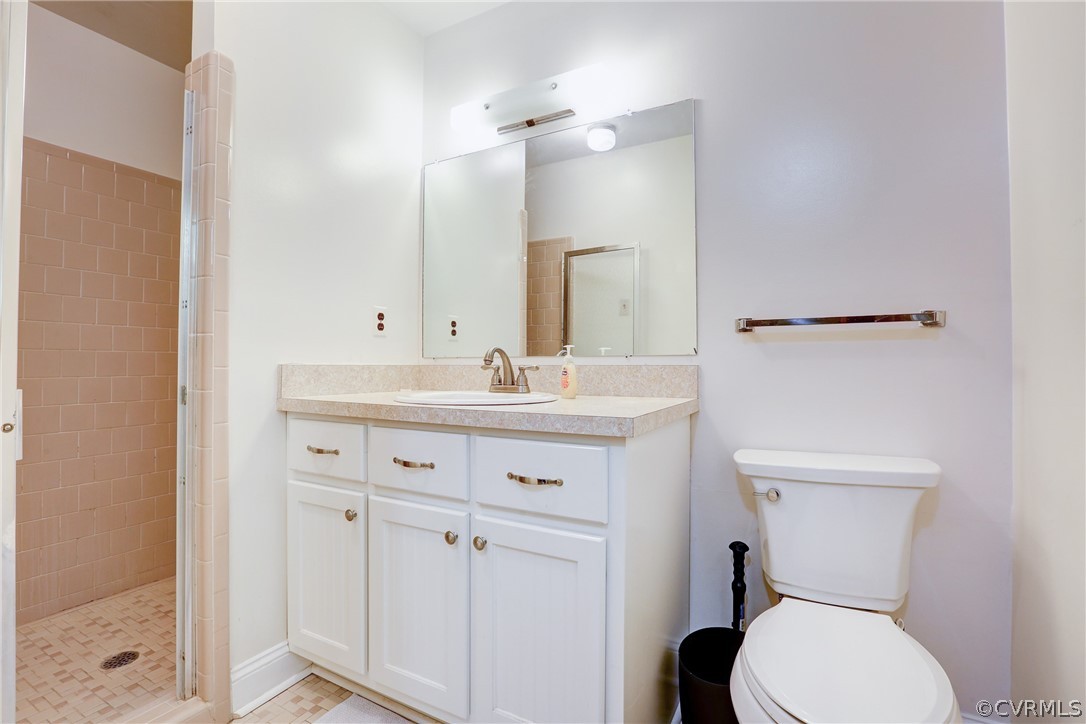 7401 Old Roxbury Road Quinton, VA 23141 - Photo 12 of 32 Tile Shower, Vanity, and Large Linen Closet
