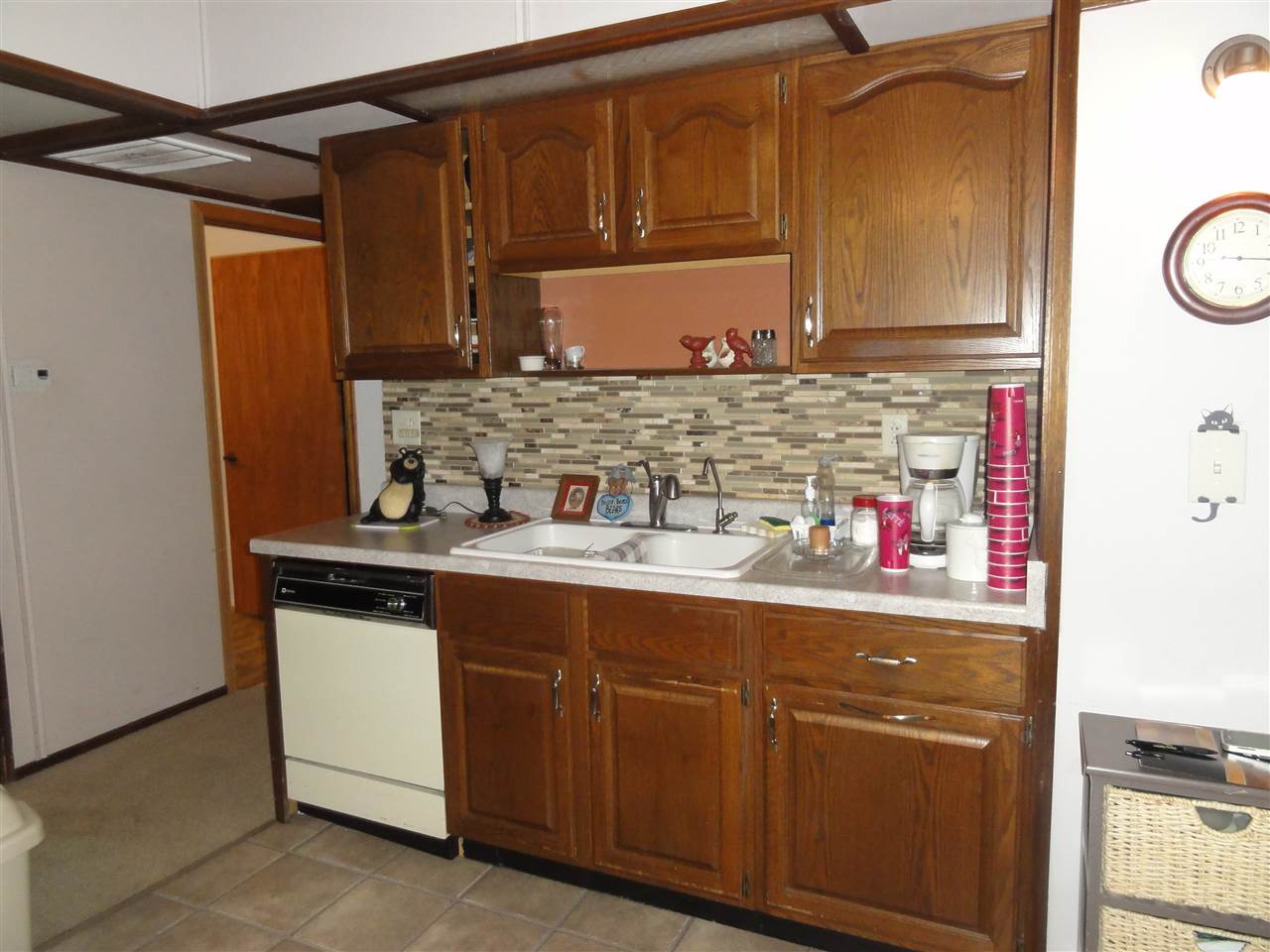 14913 Prairie Road Rockton, IL 61072 - Photo 11 of 19 a kitchen with stainless steel appliances granite countertop a sink and cabinets