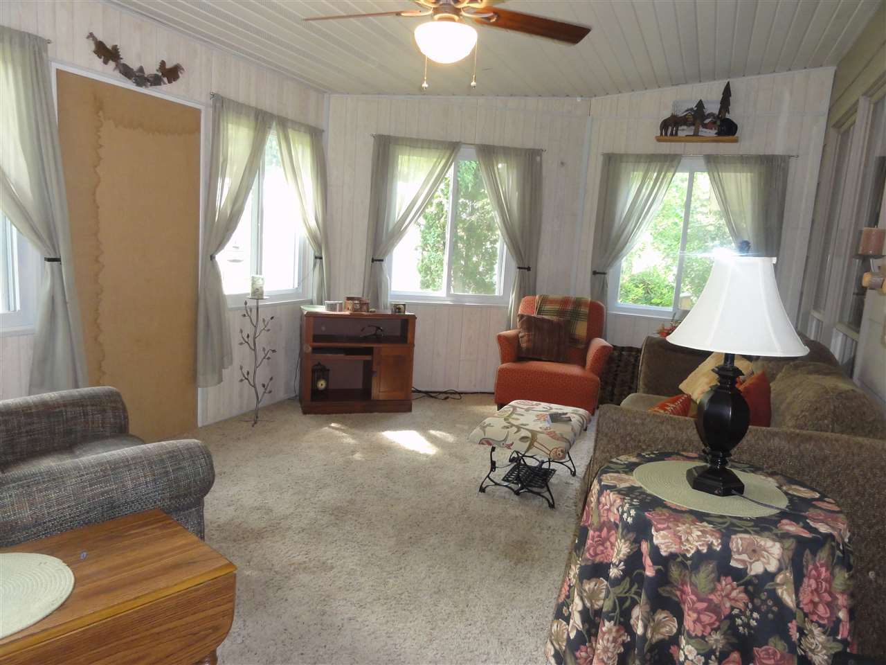 14913 Prairie Road Rockton, IL 61072 - Photo 13 of 19 a living room with furniture and a large window
