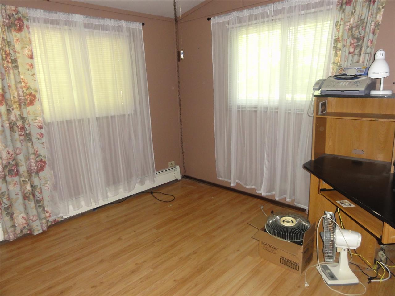 14913 Prairie Road Rockton, IL 61072 - Photo 17 of 19 a view of an empty room with a window