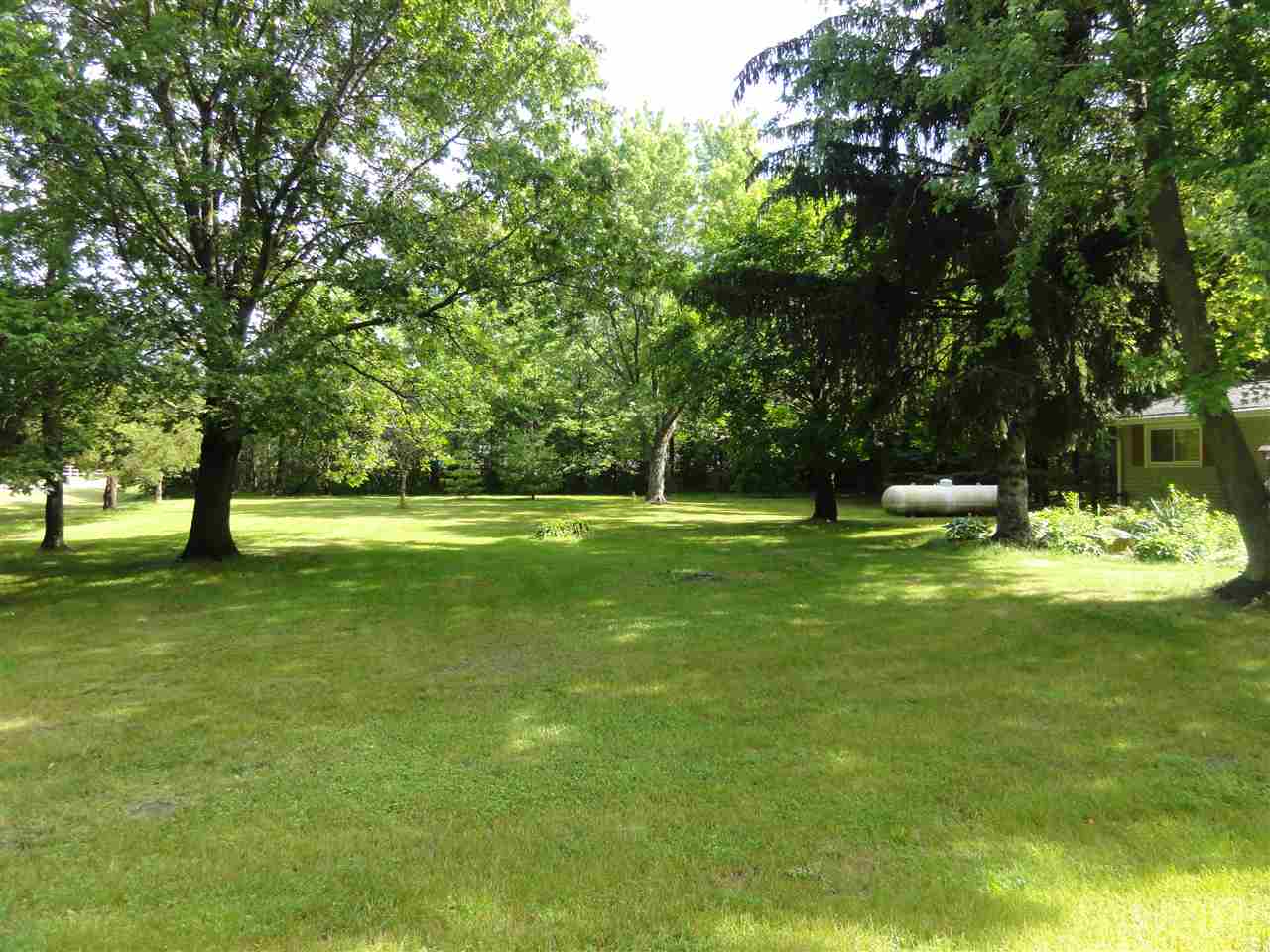 14913 Prairie Road Rockton, IL 61072 - Photo 5 of 19 a view of a tree in a yard