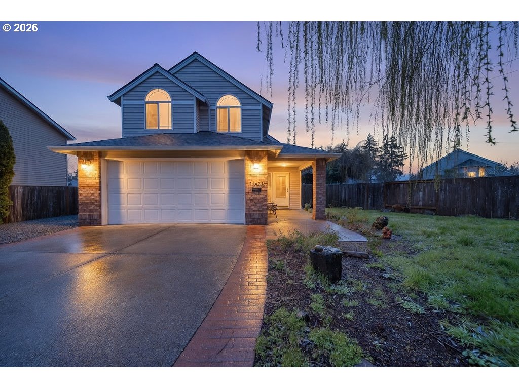 a house view with a garden space