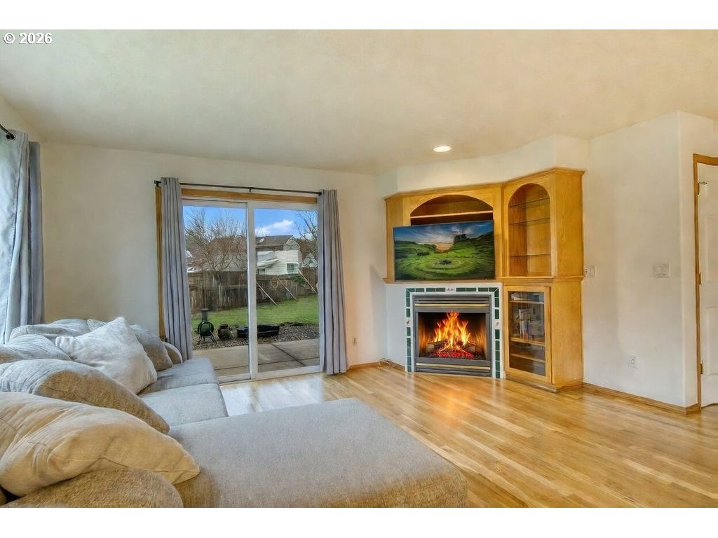 34672 Cascade Street St. Helens, OR 97051 - Photo 12 of 42 a bedroom with furniture and a fireplace