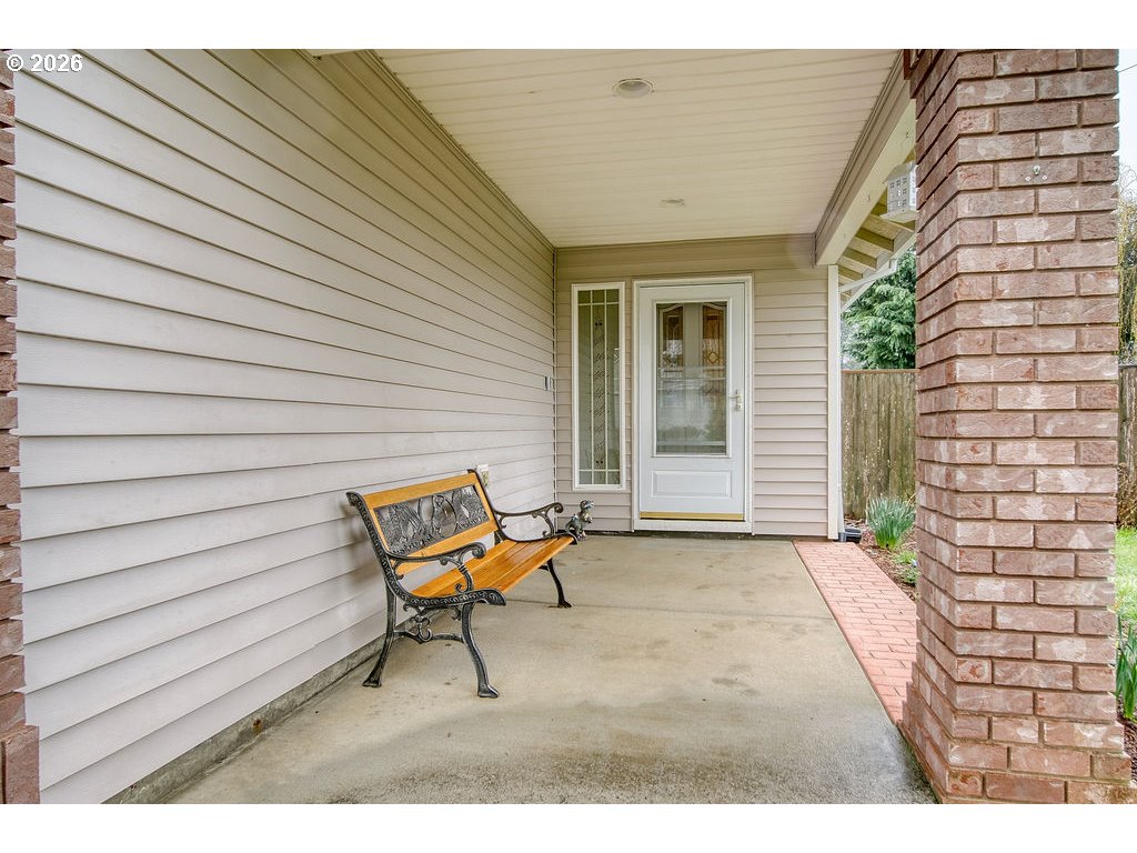 34672 Cascade Street St. Helens, OR 97051 - Photo 6 of 42 a backyard of a house with table and chairs