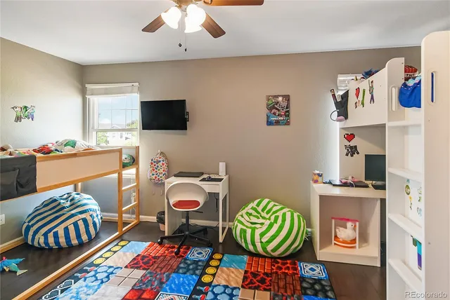 a room with furniture and a flat screen tv