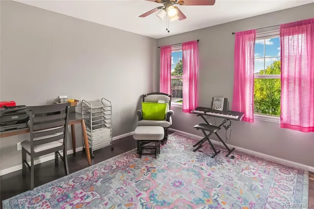 a workspace with furniture and a window