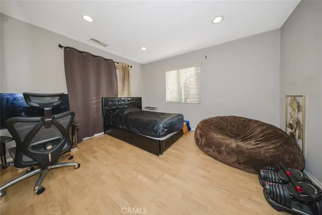 a living room with a couch and a window