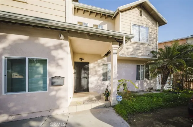 a front view of a house with a porch