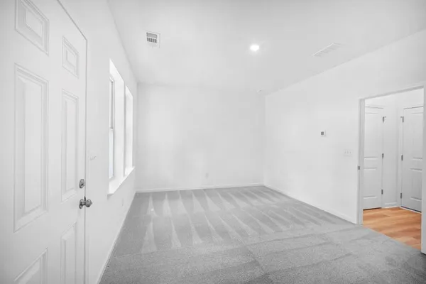 an empty room with windows