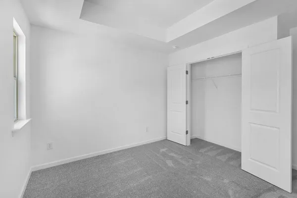 an empty room with closet