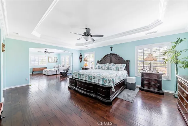 a bedroom with a bed furniture and a window