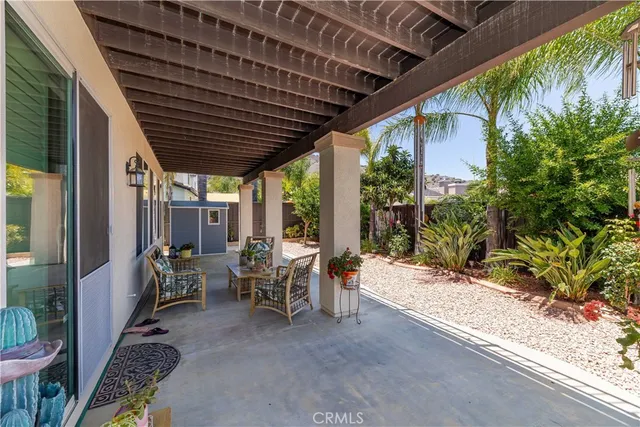 a vase of flowers sitting on a floor