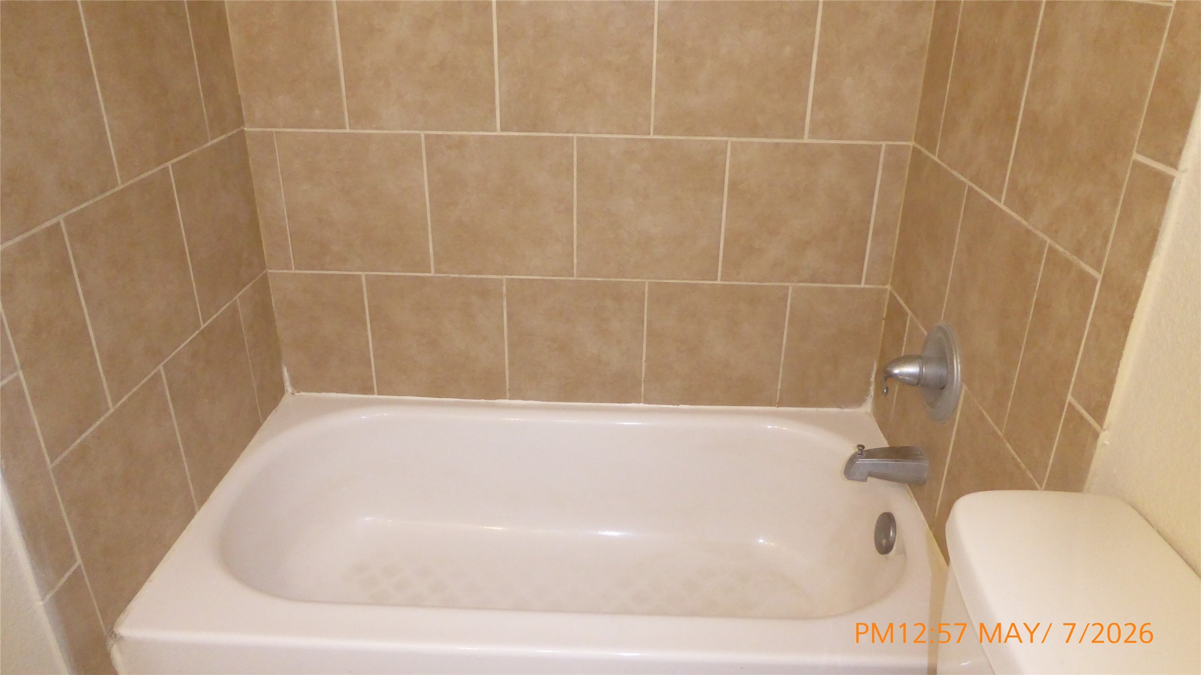2308 Stevens Street Houston, TX 77026 - Photo 11 of 12 a bathroom with a bathtub