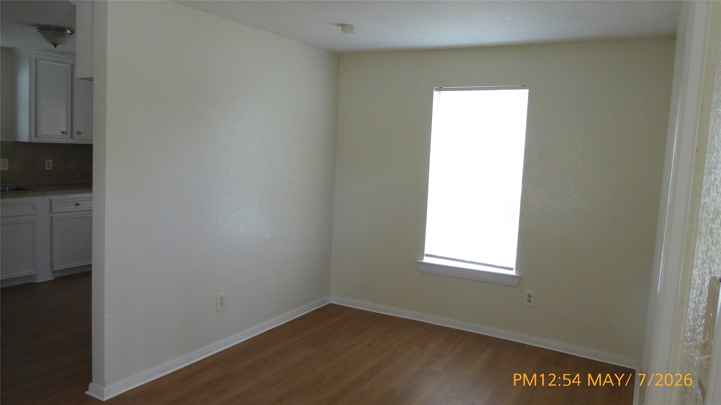 2308 Stevens Street Houston, TX 77026 - Photo 5 of 12 a view of an empty room with a window