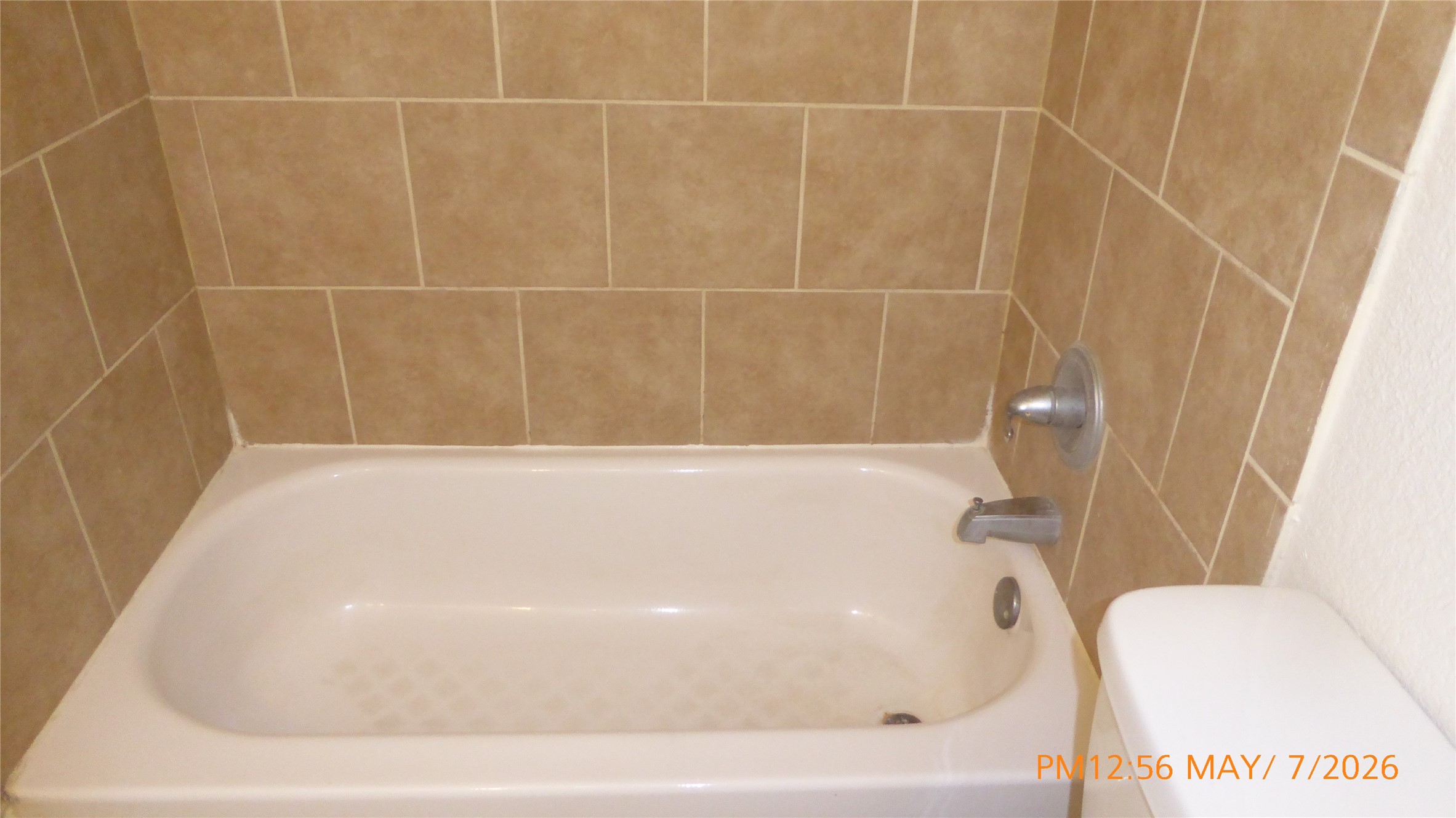 2308 Stevens Street Houston, TX 77026 - Photo 9 of 12 a bathroom with a bathtub