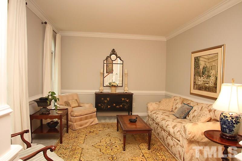12301 Staunton Court Raleigh, NC 27613 - Photo 3 of 25 a living room with furniture and a window