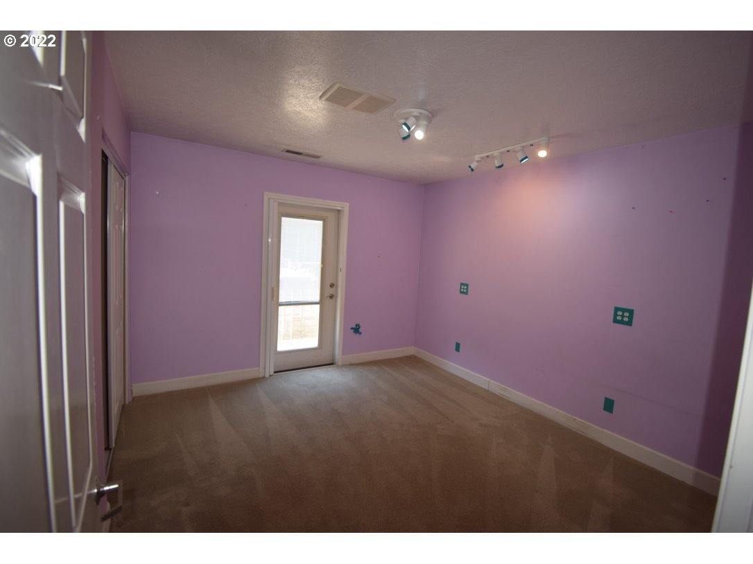 8717 Northeast Webster Street Portland, OR 97220 - Photo 17 of 30 a view of empty room