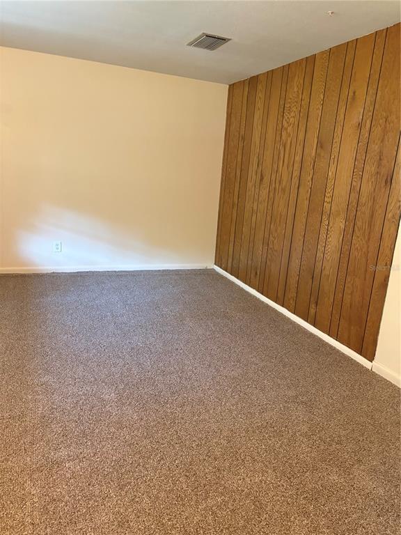 5107 East 120th Avenue Temple Terrace, FL 33617 - Photo 10 of 24 a view of an empty room