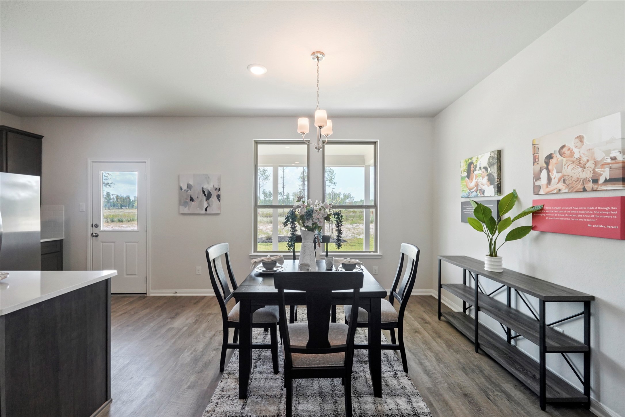 11359 White Rock Road Conroe, TX 77306 - Photo 11 of 31 a view of a dining room with furniture window and wooden floor