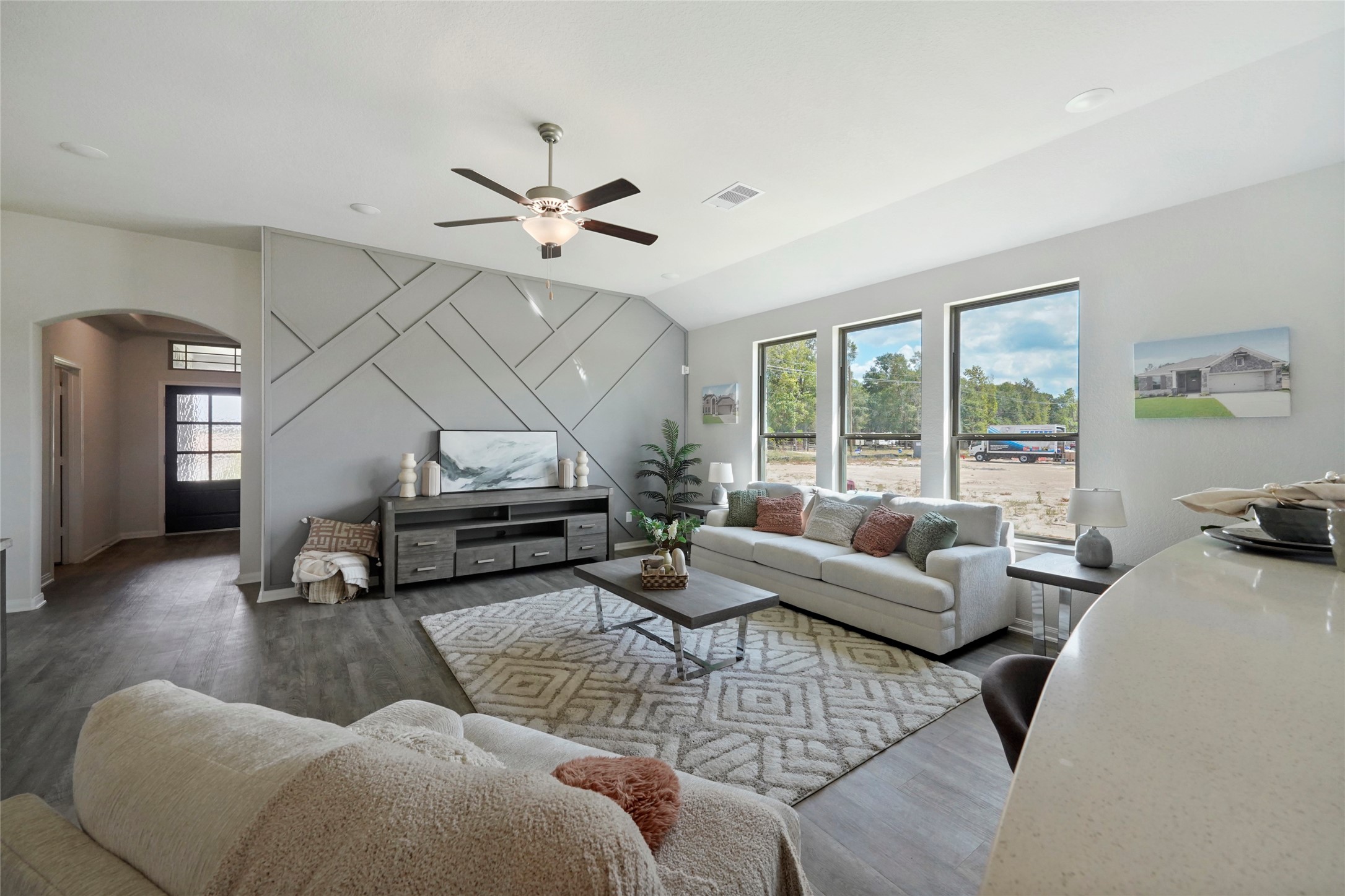 11359 White Rock Road Conroe, TX 77306 - Photo 13 of 31 a living room with furniture and a large window