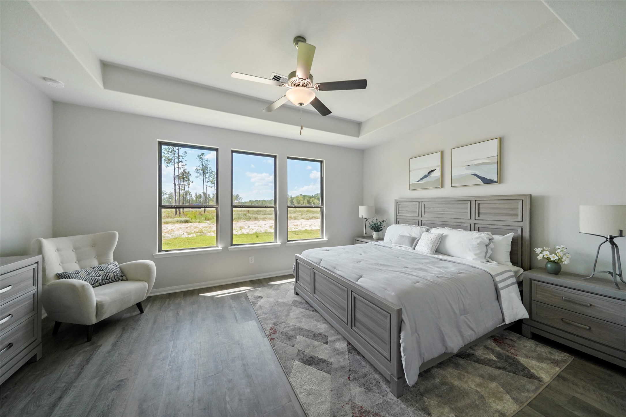 11359 White Rock Road Conroe, TX 77306 - Photo 17 of 31 a bedroom with a bed and wooden floor