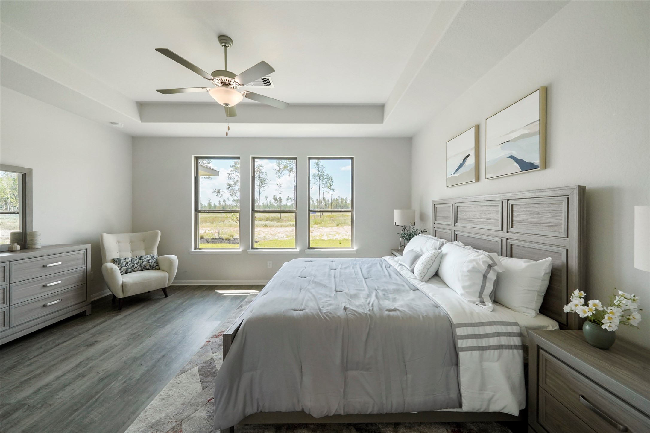 11359 White Rock Road Conroe, TX 77306 - Photo 21 of 31 a bedroom with a bed and wooden floor