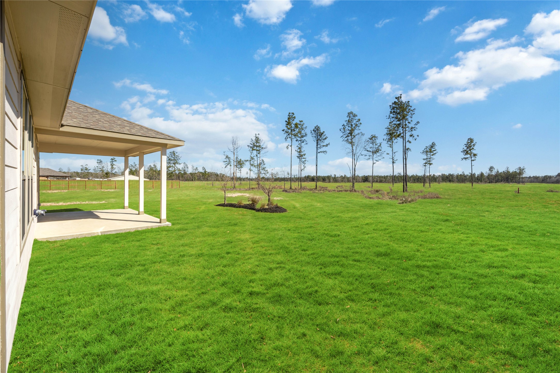 11359 White Rock Road Conroe, TX 77306 - Photo 25 of 31 a view of a golf course with a lake view