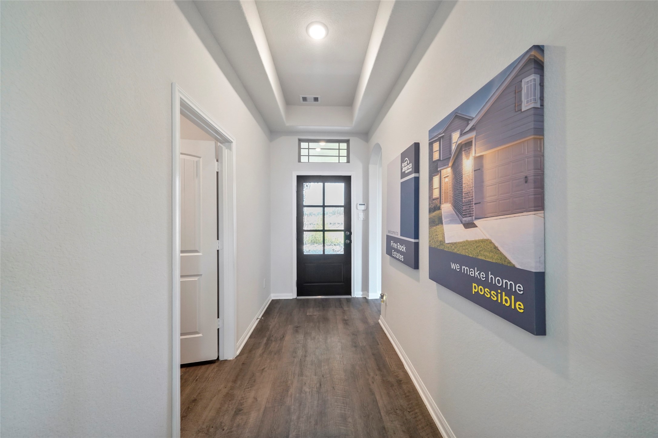 11359 White Rock Road Conroe, TX 77306 - Photo 5 of 31 a view of a hallway view with wooden floor and staircase