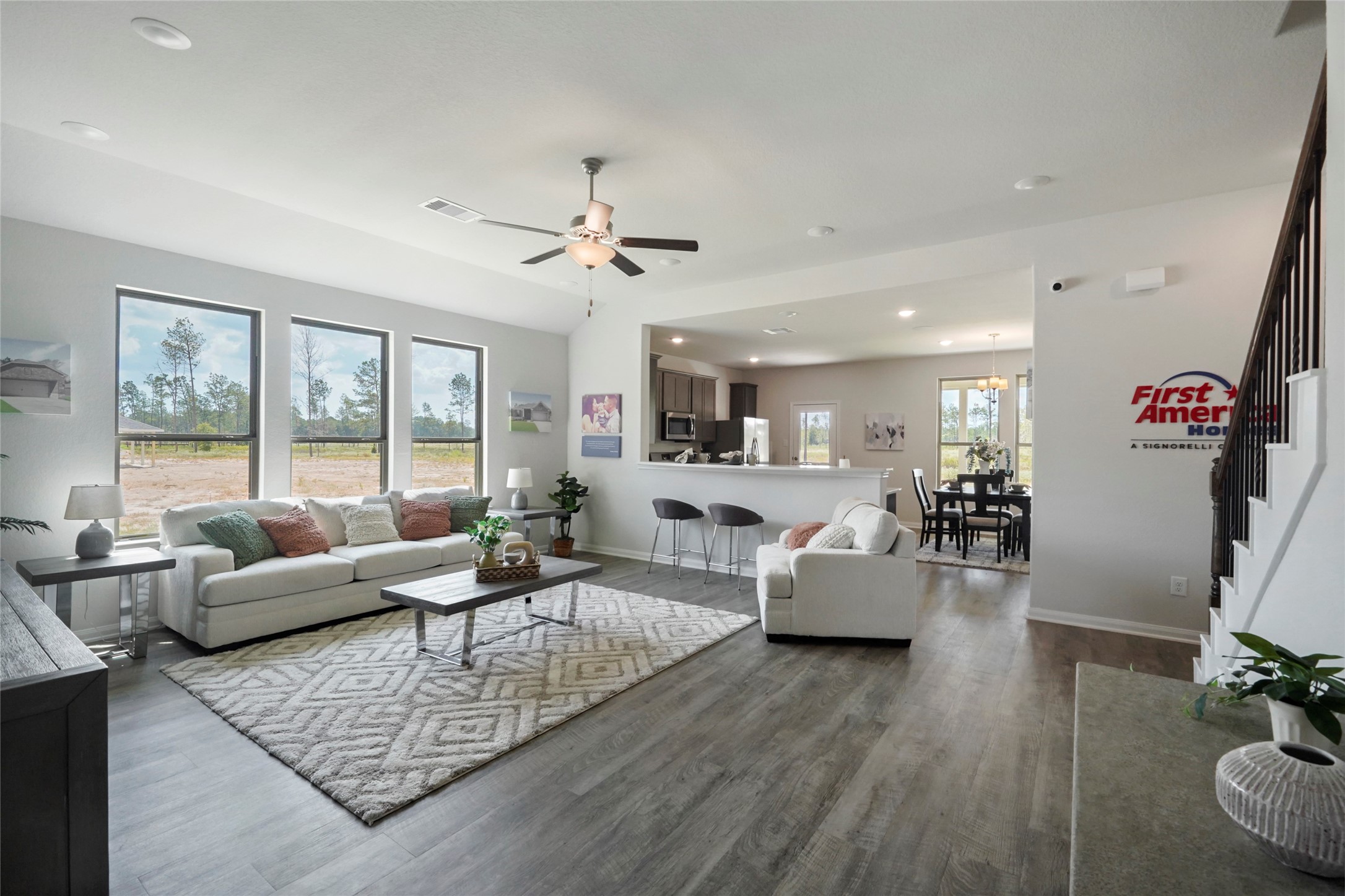 11359 White Rock Road Conroe, TX 77306 - Photo 7 of 31 a living room with furniture or couch and a large window