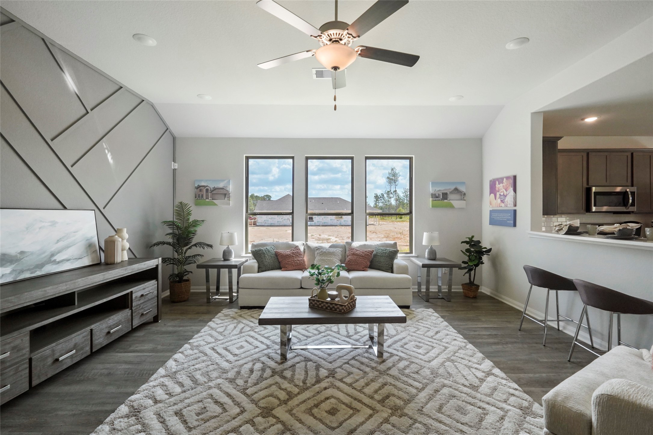 11359 White Rock Road Conroe, TX 77306 - Photo 8 of 31 a living room with furniture and a flat screen tv