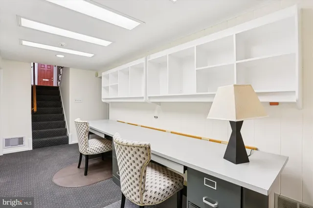 a view of livingroom with furniture and window