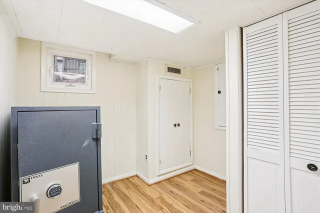 a view of a kitchen with a refrigerator and a stove