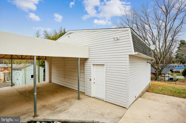 a house with trees in front of it