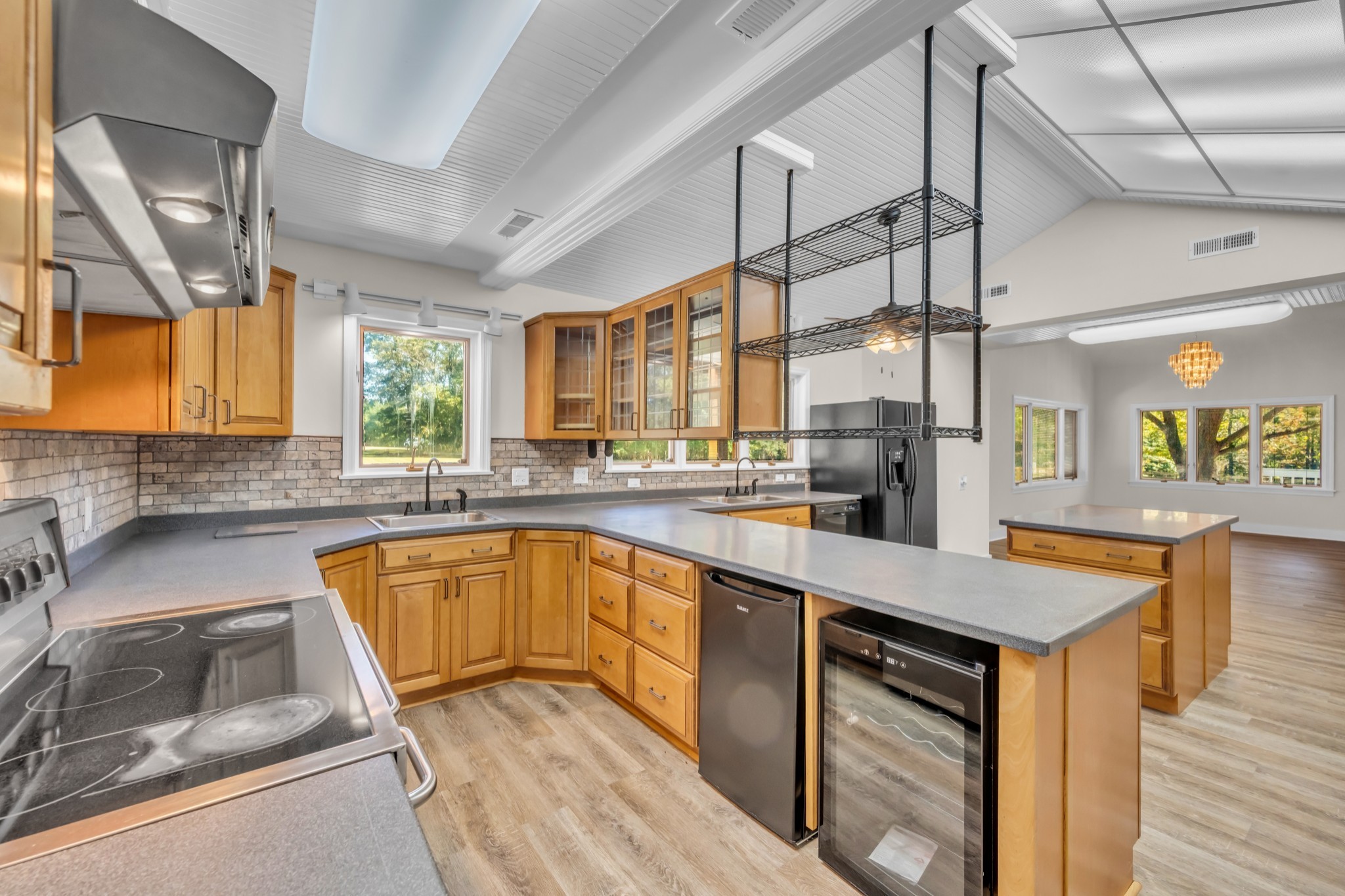 168 Oliver Smith Road Flintville, TN 37335 - Photo 17 of 86 a kitchen with stainless steel appliances granite countertop a sink a stove and a wooden floors