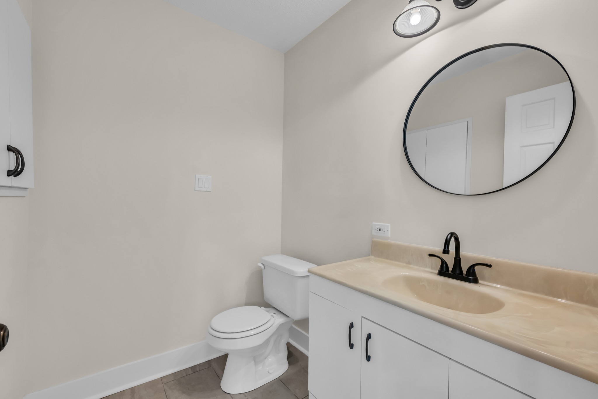 168 Oliver Smith Road Flintville, TN 37335 - Photo 24 of 86 a bathroom with a sink a toilet and a mirror