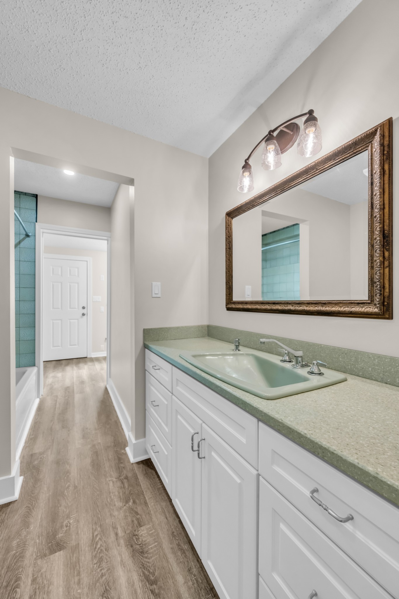 168 Oliver Smith Road Flintville, TN 37335 - Photo 31 of 86 a bathroom with a toilet sink and mirror