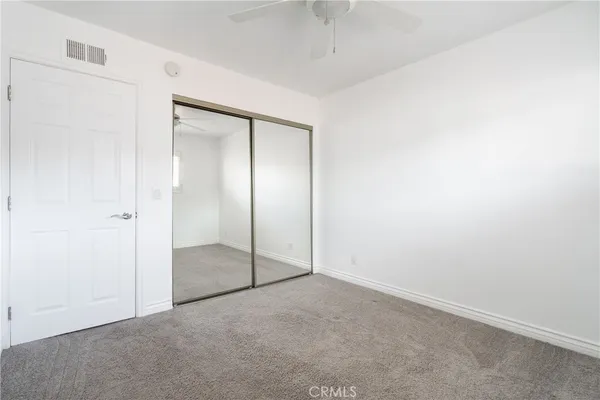a bathroom with a vanity and a mirror