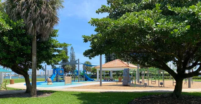 a view of a fire pit and a yard