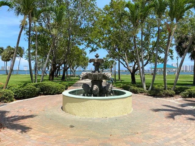 a view of a park and trees