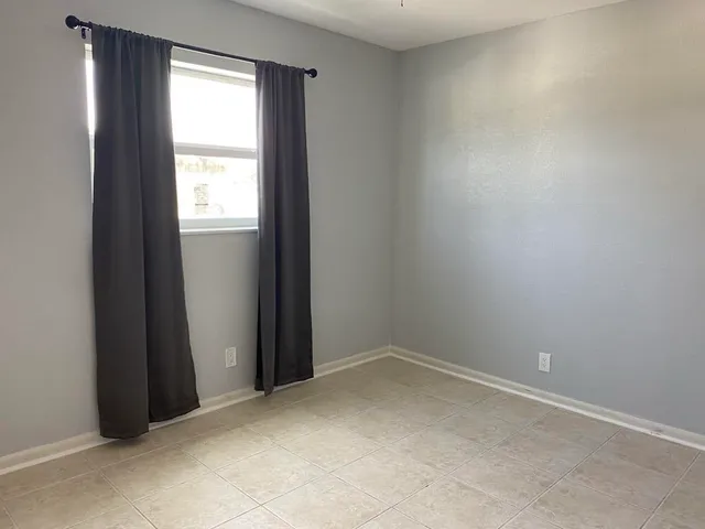 an empty room with a window