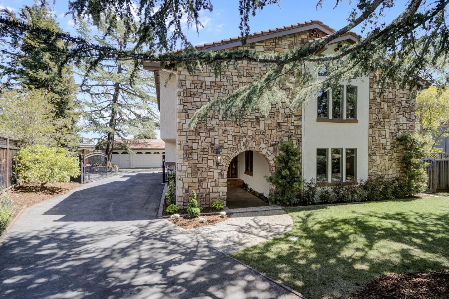 a front view of a house with yard