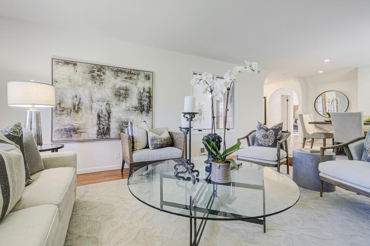 370 Quinnhill Road Los Altos, CA 94024 - Photo 12 of 58 a living room with furniture and a lamp
